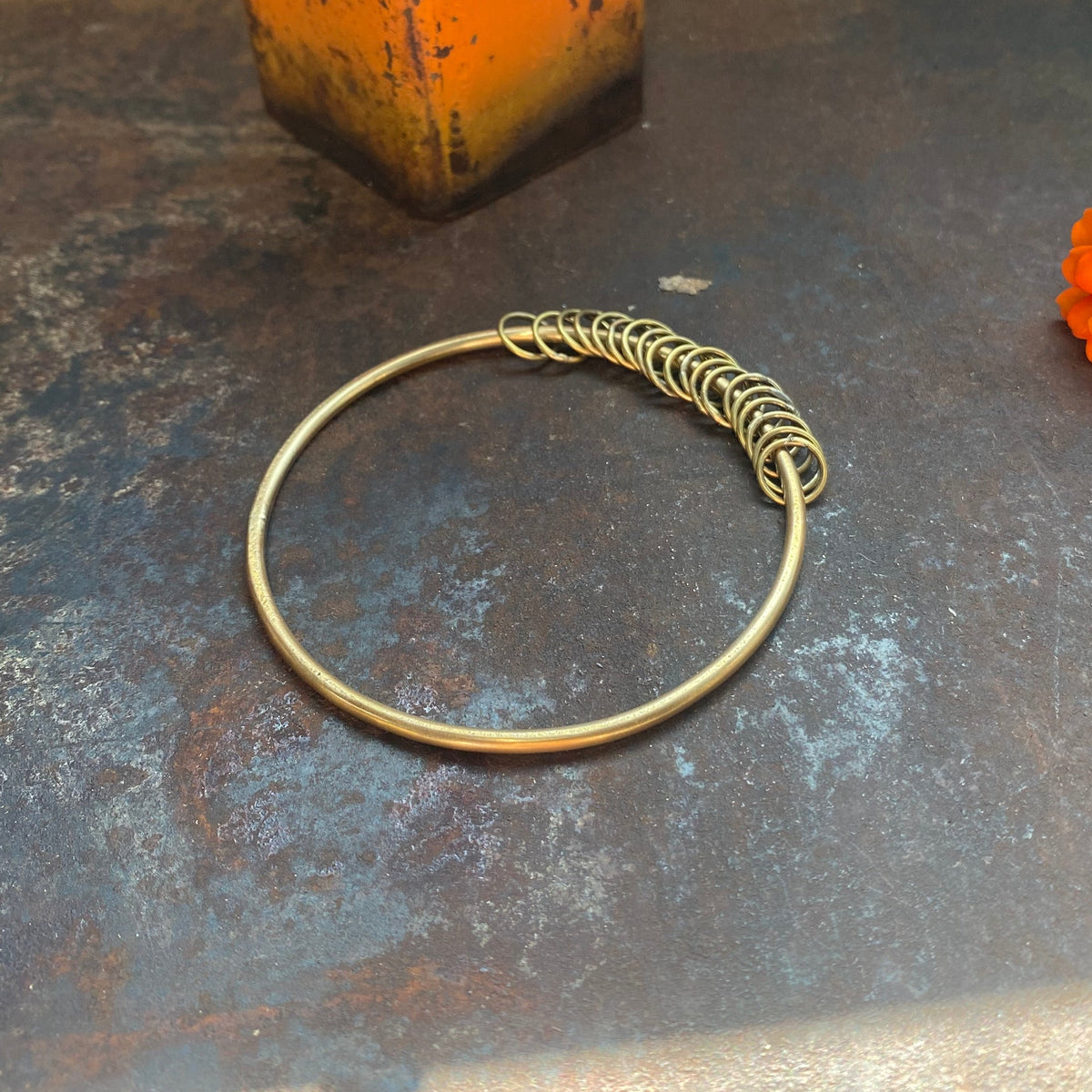 Handforged Brass Bangle with chimes that move and make music