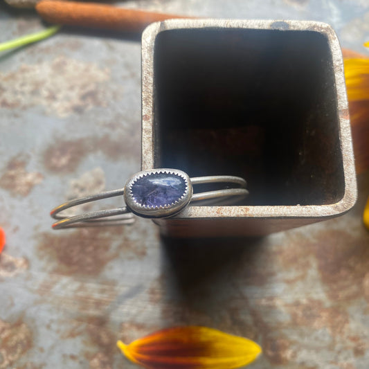 Handmade sterling silver cuff with hand-cut iolite gemstone, one-of-a-kind talisman jewelry