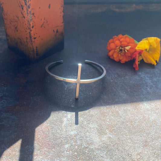 Handforged sterling silver cuff bracelet featuring a T-shaped center detail with a minimalist, industrial-inspired design by Zama Designz.