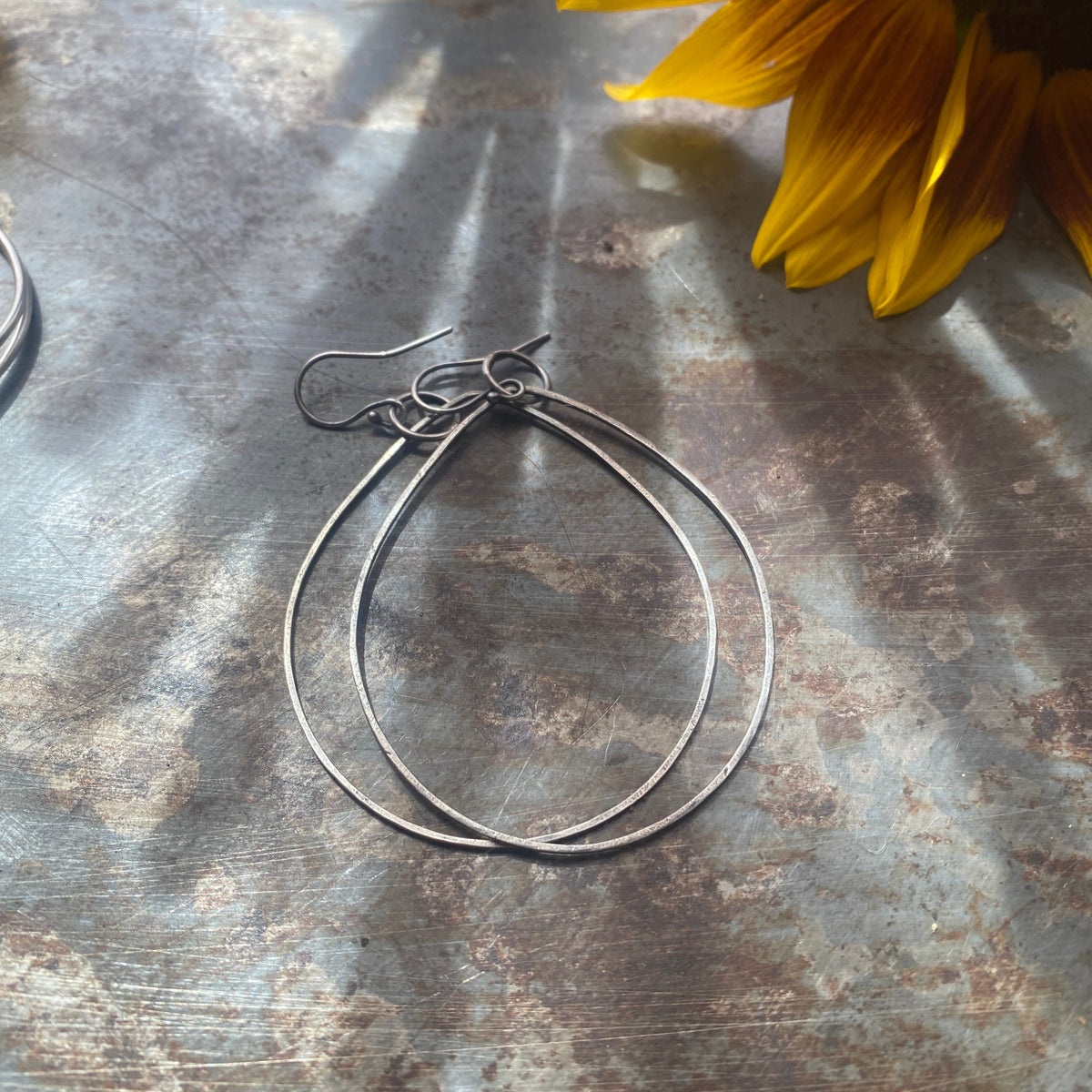 Hand-forged sterling silver oval dangle earrings, handmade artisan jewelry